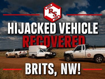 Recovered hijacked vehicles shown in an open area with company logo.