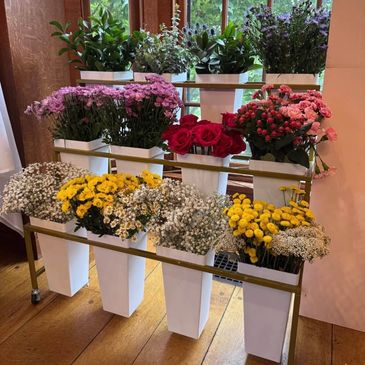 $100 for stand, Fresh seasonal florals available for an additional cost 