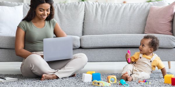 Child and mom working, Play is the occupation of childhood Royalty-free image via Adobe Stock