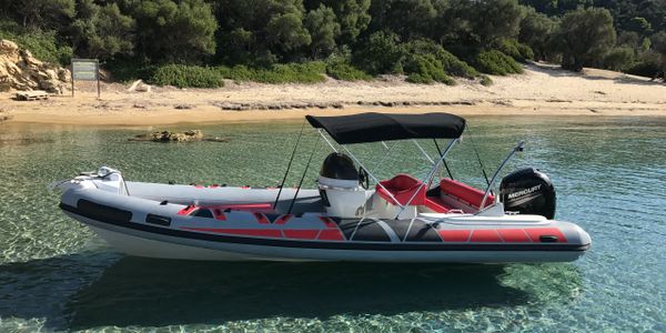 Hire a boat for a day and explore Skiathos beaches.No License Required.