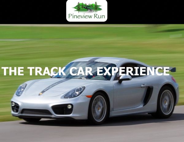 Silver sports car speeding on a track with Pineview Run logo.