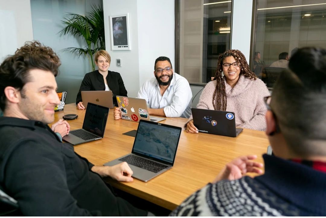 team meeting in office relaxed friendly vibe