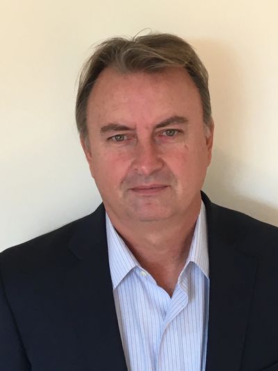 Man in a suit with a striped shirt