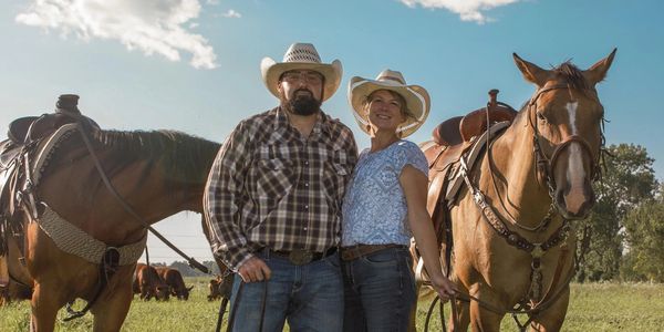 Couple with horses