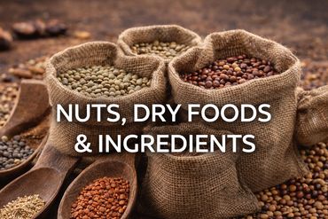 Sacks and spoons filled with assorted nuts and dry foods on a rustic surface.