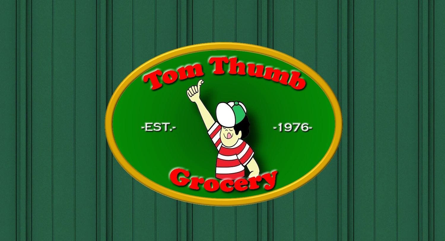 Tom thumb logo on green colored corrugated metal background mimicking our building's facade.