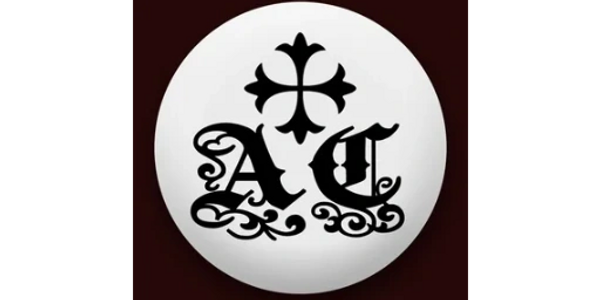Black gothic-style letters A and D with a cross on a white circular background.