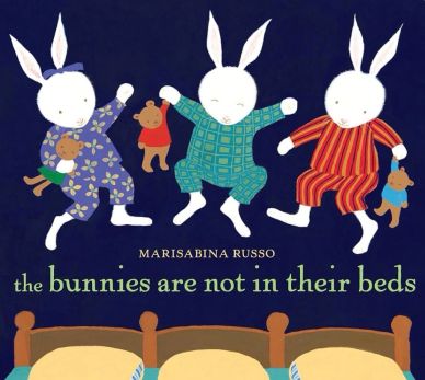 Three bunnies in colorful pajamas jumping above beds at night.
