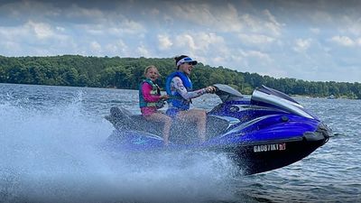 Mom and daighter riding with Lake Lanier Jetski Rental