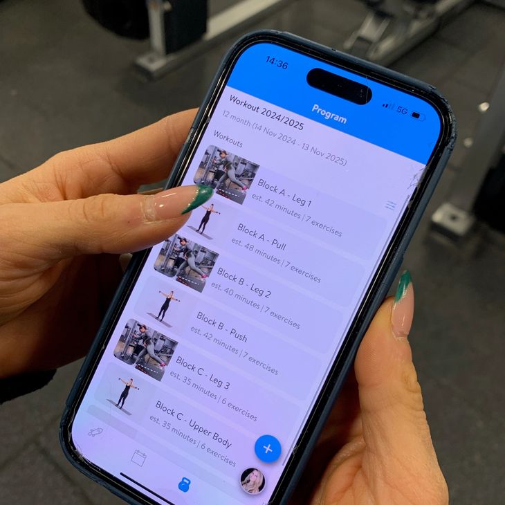 Trainer check-in and habit streaks on phone