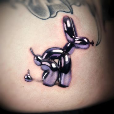 Hyper Realistic Balloon Dog Tattoo done by Ven in Syracuse New York 