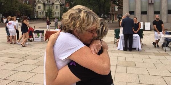 Ben’s first drug and alcohol counselor embraces Rhonda after learning the news of Ben’s passing.