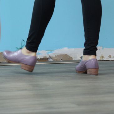 tap dancing with our professional faculty and their custom tap shoes