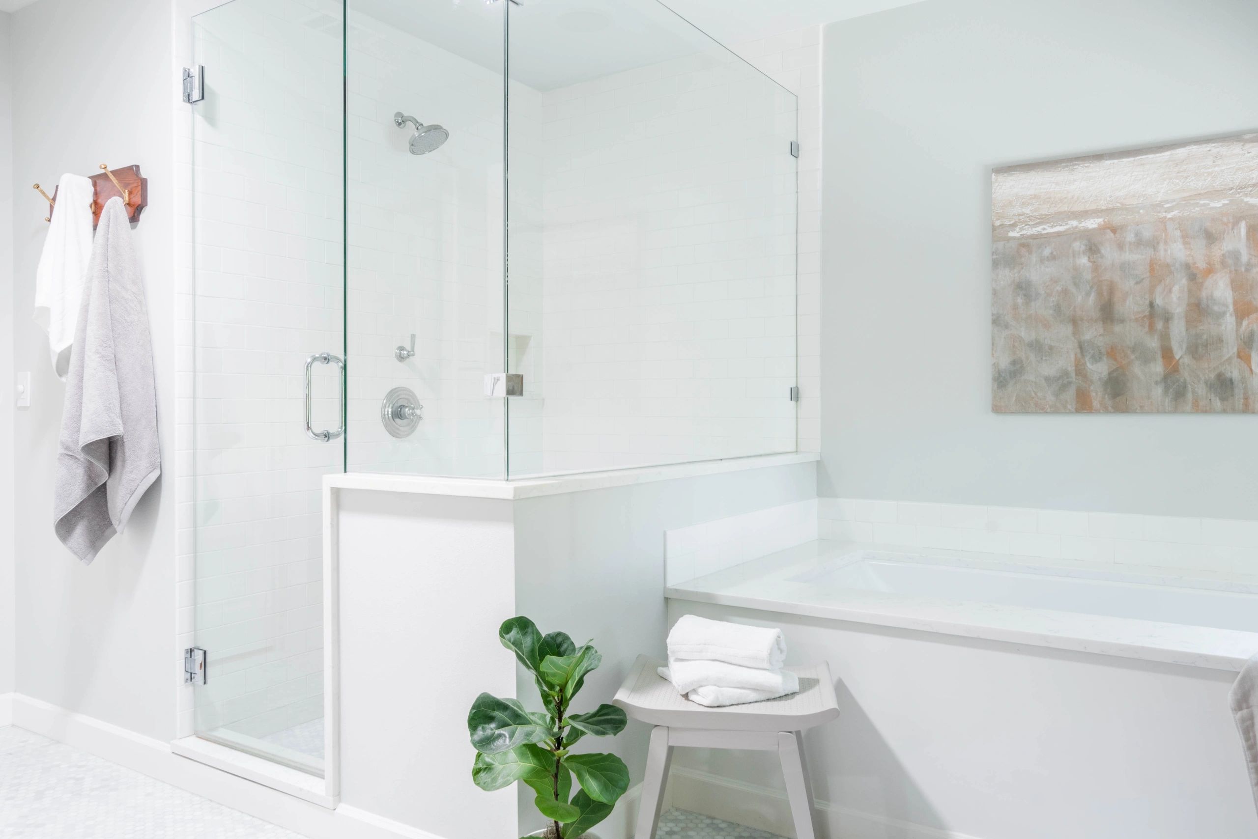 Transitional bathroom with alcove tub, walk-in shower and frameless glass in Austin, TX