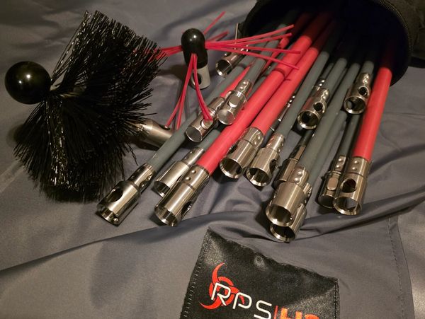 RPS H3 chimney cleaning rods and brushes laid out on a grey fabric. Chimney sweep Selby, York, 