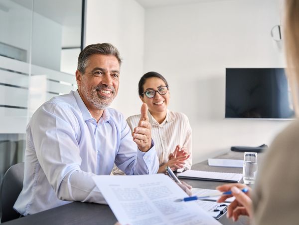 A team of people having a meeting in an office