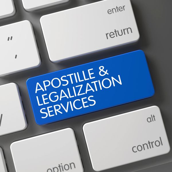 Blue keyboard key with the words Apostille & Legalization Services.