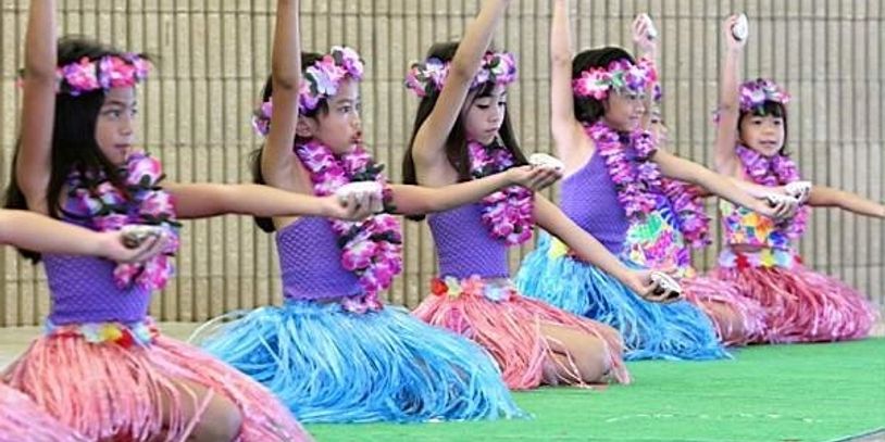 Children dancing in a hula lesson