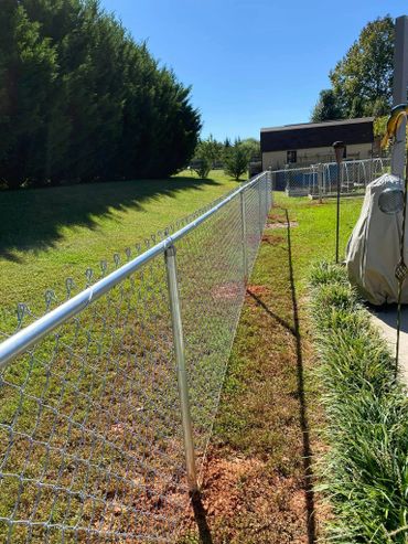 Galvanized chain-link for yard pets. 