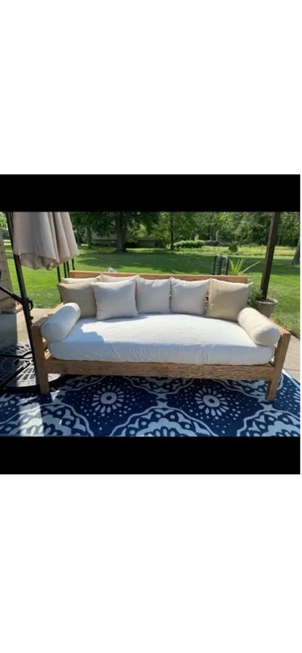 Custom built outdoor daybed made from reclaimed White Oak.