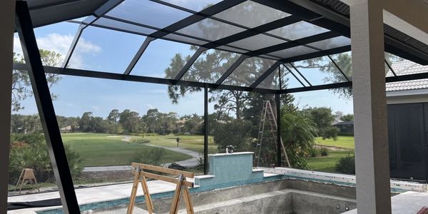 pool enclosure with high grade aluminum, screening, picture window, bronze lanai, no seeum screen