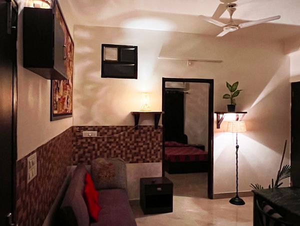 Ticana Serviced apartment Living space with Fully Equipped Kitchen. AC Bedroom and a large Balcony