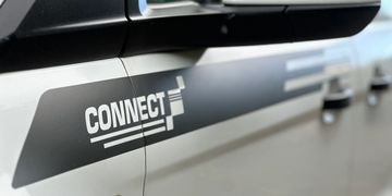 Close-up of a car door with a 'CONNECT' decal.
