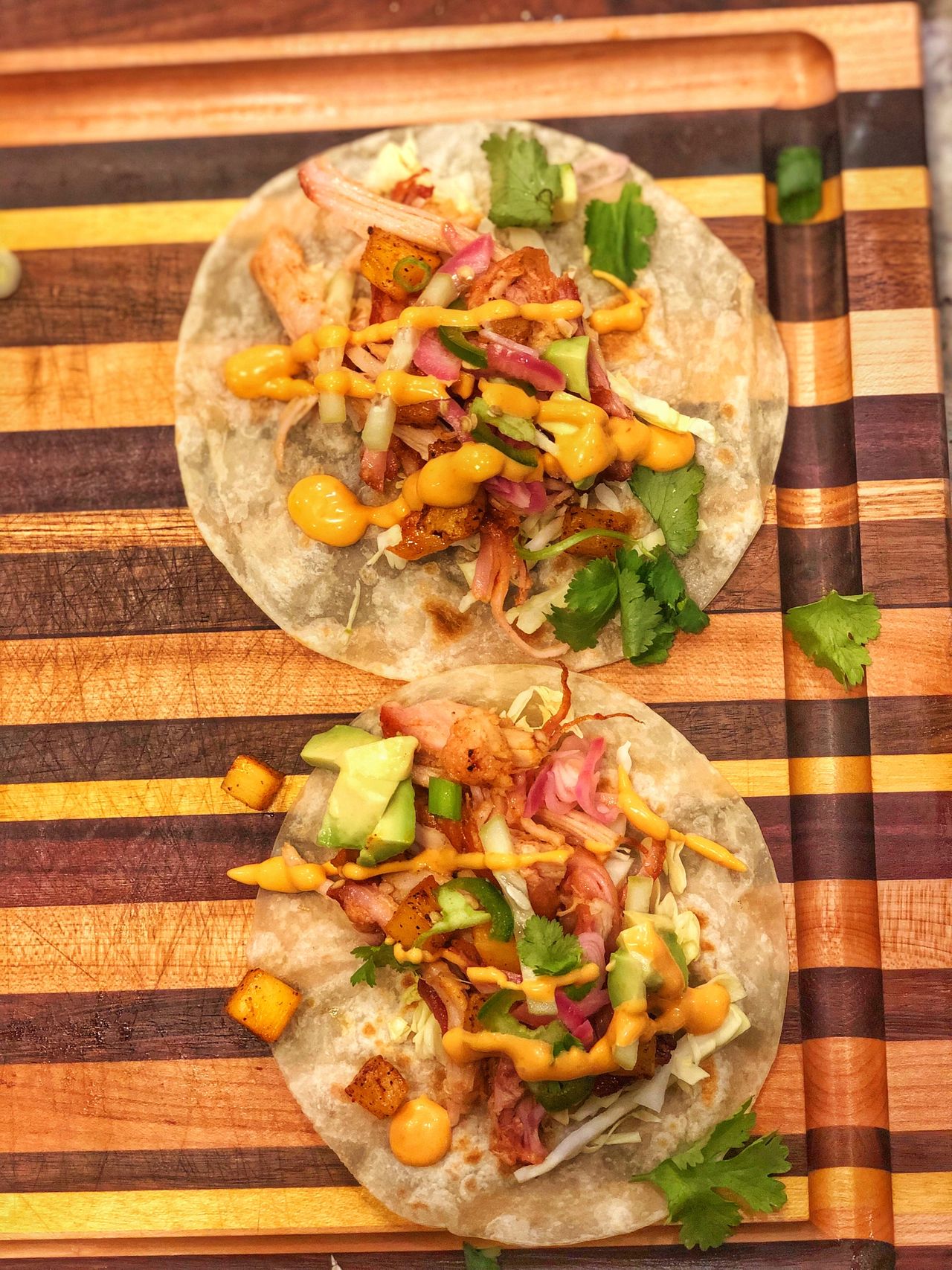 Shredded pork belly tacos. 