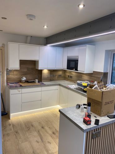 LED strip lighting in kitchen. under cupboard and plinth lighting
