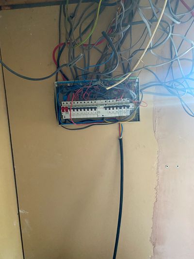 unsafe consumer unit, no lid, no rcd, bare cables