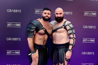 Two men in gladiator-style costumes at a Grabbys event.