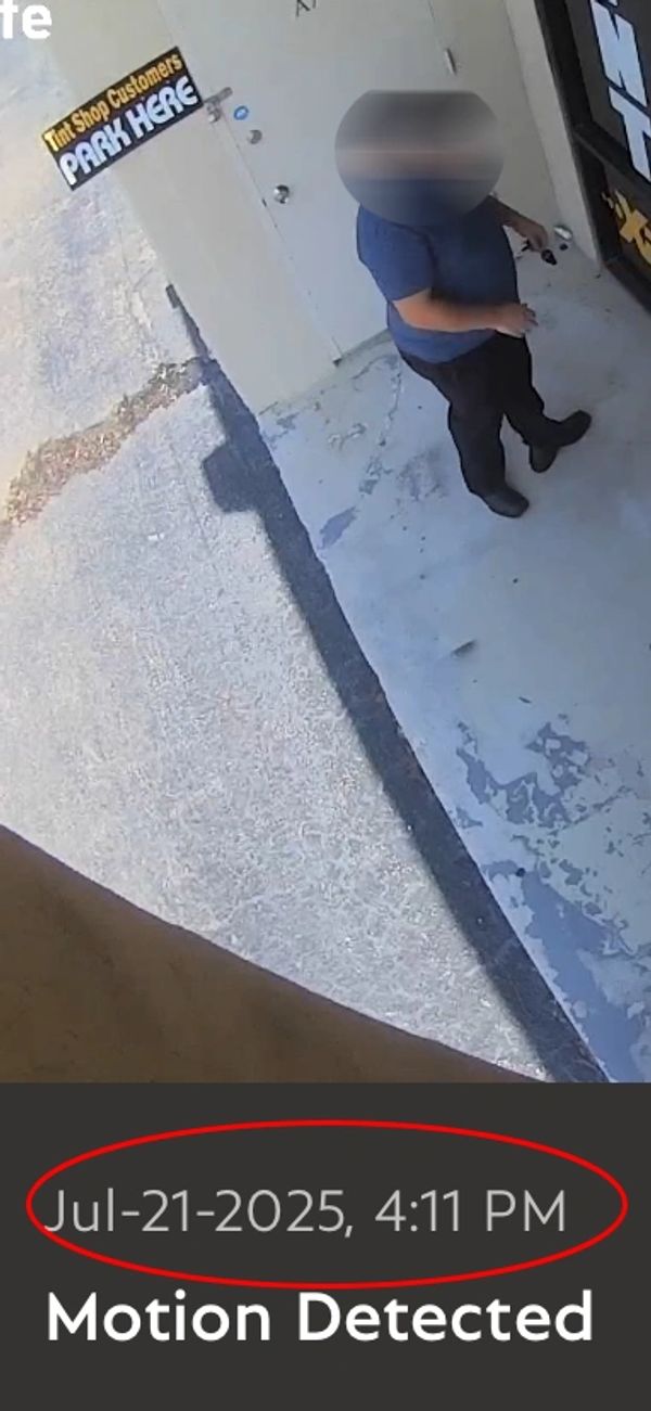 Person at a door with a motion detection timestamp.