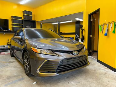 2024 Toyota Camry Hybrid after its windows were tinted at our tint shop near Port St Lucie, Florida