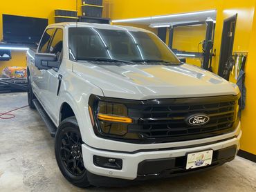 Brand new 2024 Ford F-150 after we tinted the windows at our tint shop.