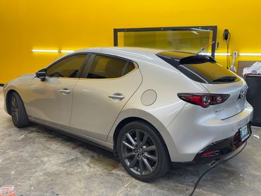 2023 Mazda 3 hatchback tinted with Xpel CS car tint.