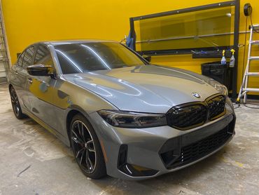 Picture of 2023 BMW Competiton after we installed XPEL window tint on it at our shop in Fort Pierce