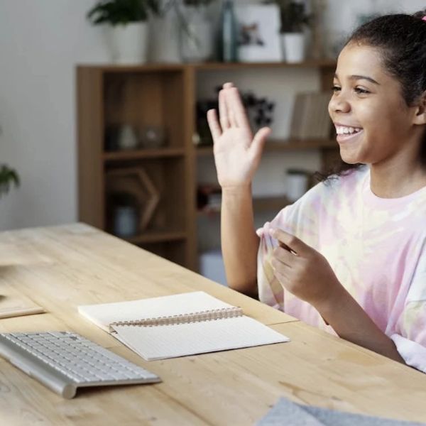 Young girl tutoring online