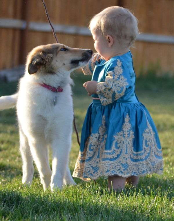 Baby with puppy.