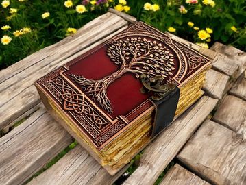Thick journal, tree of life cover.  Tea colored paper, looks aged.