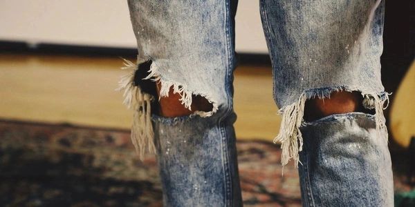 rugged denim jeans knee cut denim
