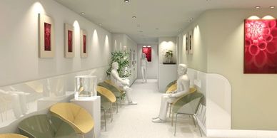 Modern waiting room with minimalist chairs and red artwork on cream walls.