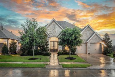 Beautiful house with a sunset sky.