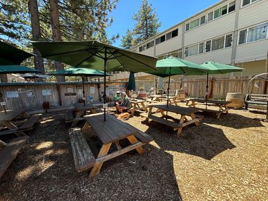 backyard beer garden patio with tables