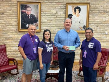 Presenting the check to the Robb Memorial Fund in Uvalde, TX