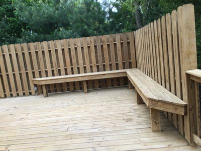 Pressure strip old deck stain, sand and new stain.  Restore the life of your deck