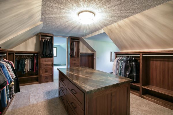 Walnut Walk-in closet with Murphy Door