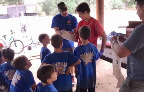 Scouts are helpful - learning first aid, preparing for emergencies or gathering food for others.