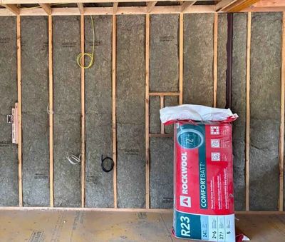 A room wall insulated with Rockwool Comfortbatt, R23 thermal insulation.