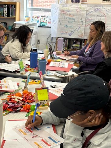 A group of adults engaged in a collaborative workshop or training session.