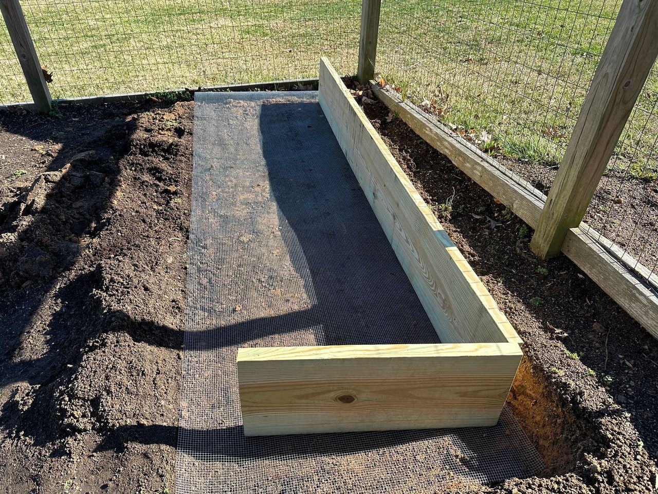 We do put 1/4"x1/4" wire underneath our raised beds to discourage vole activity.